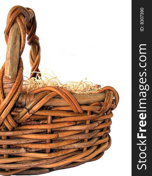 Cane basket with straw isolated on white background