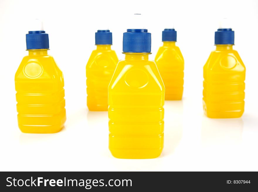 Pop top juice bottles isolated against a white background. Pop top juice bottles isolated against a white background