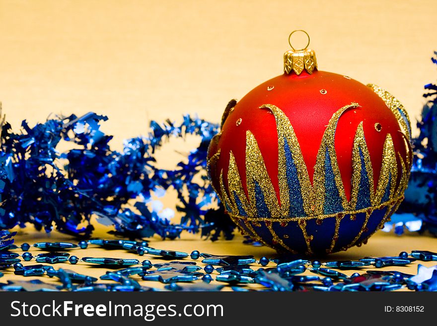 Red Christmas ball with blue decoration