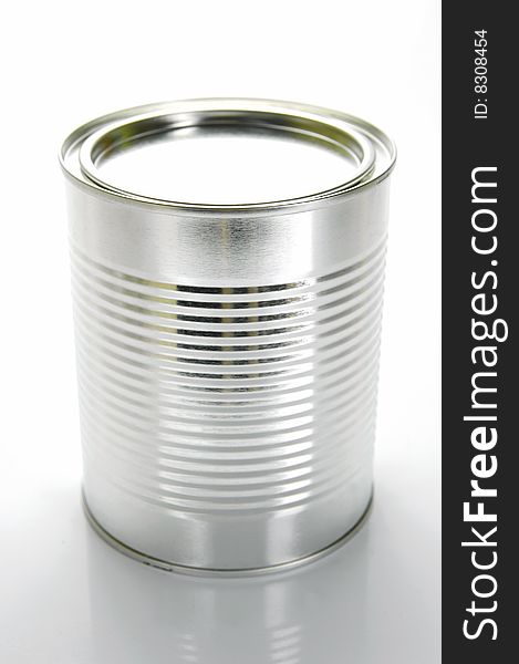 Tin canisters isolated against a white background