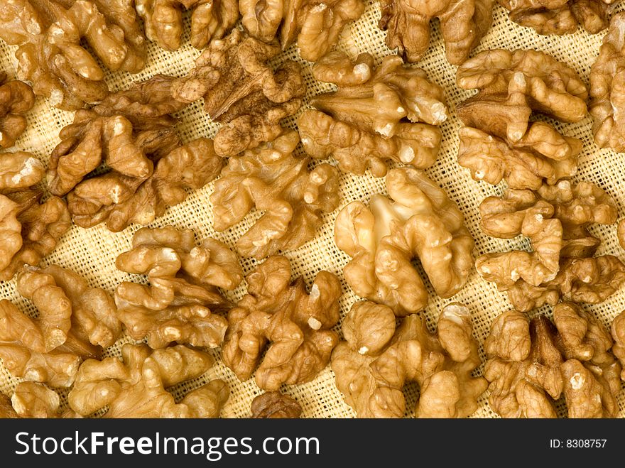 Close up of the walnut background. Close up of the walnut background