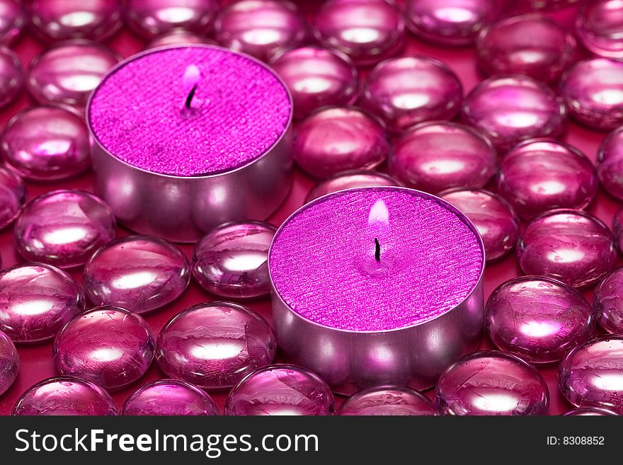 Pink candles with decoration balls