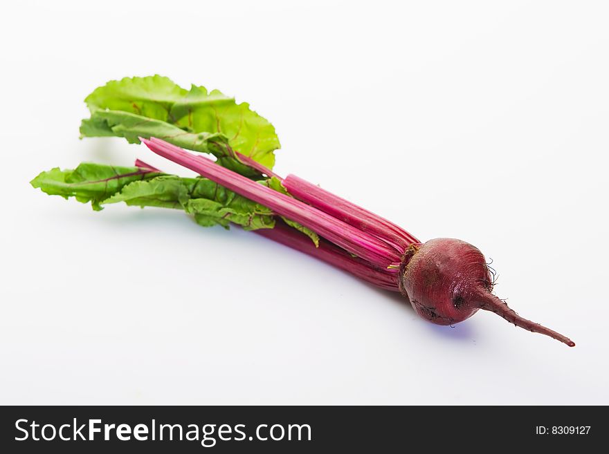 Single isolated red beetroot on white background. Single isolated red beetroot on white background