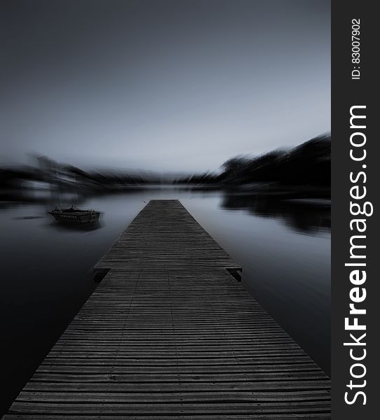 Grayscale Photo of Dock
