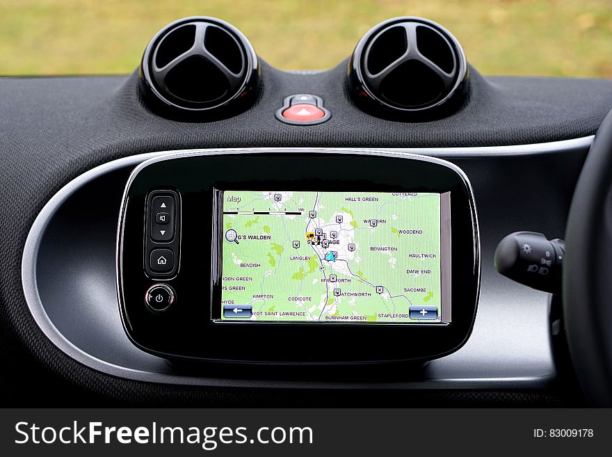 GPS navigation system on dash of automobile. GPS navigation system on dash of automobile.