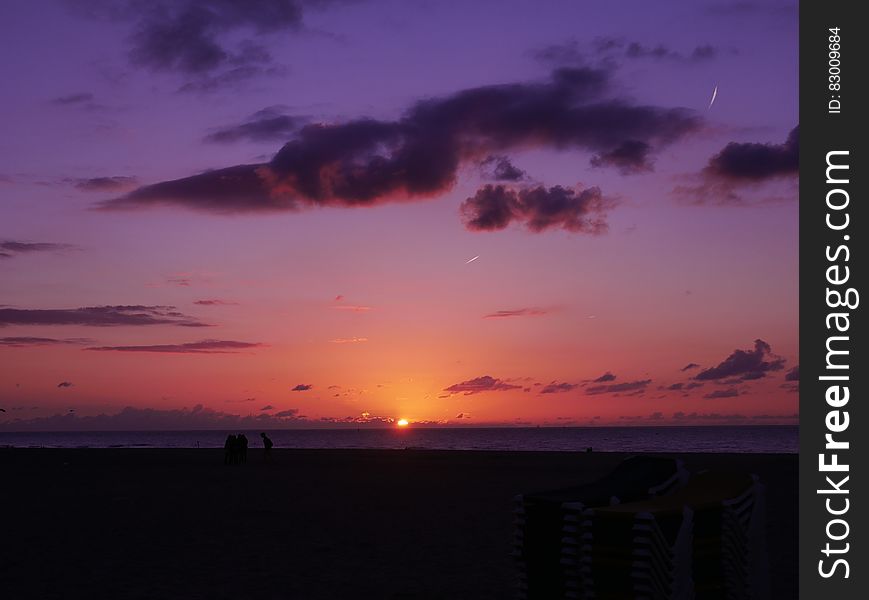 Sunset in purple skies over ocean horizon. Sunset in purple skies over ocean horizon