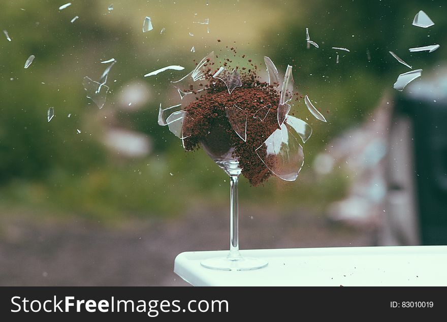 An exploding crystal glass in freeze frame. An exploding crystal glass in freeze frame.