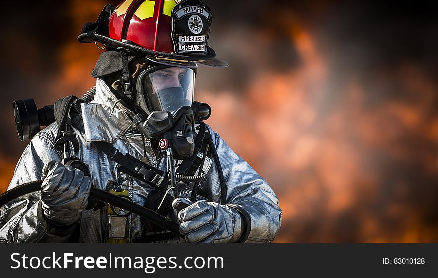 A firefighter in full gear with breathing apparatus.