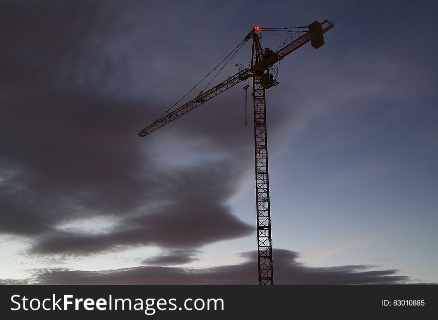 Large Crane And A Threatening Sky