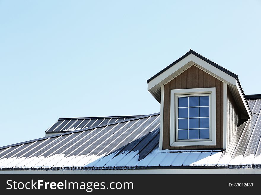 Brown and White Wooden Roof House Window