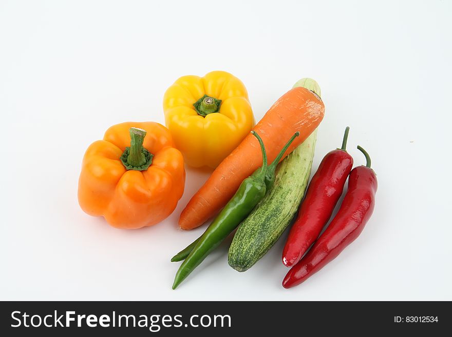 Different vegetables on a white background.