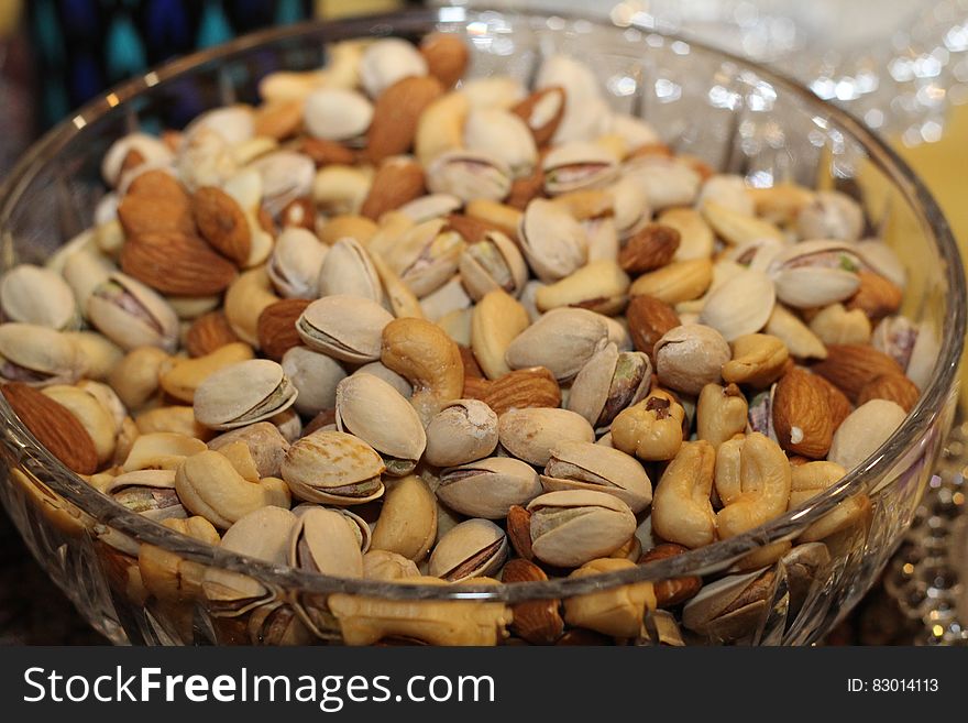 White Yellow and Brown Peanut on Clear Glass Basin