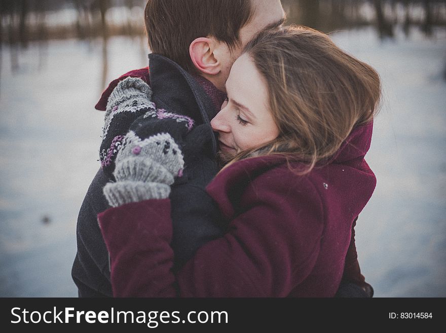 Couple In Winter Embrace