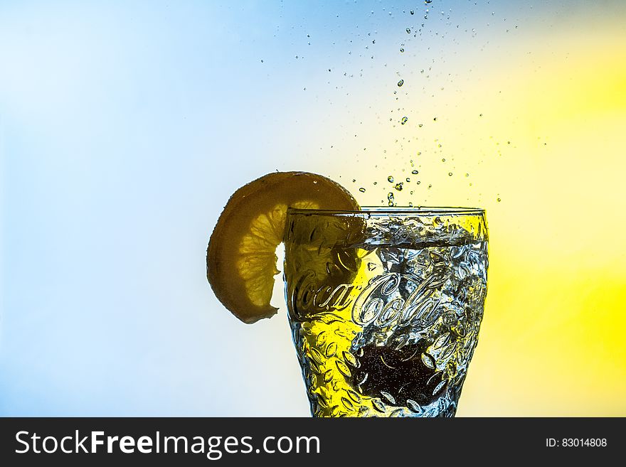 Sliced Lemon on Clear Glass