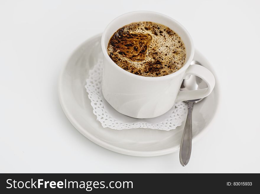White Ceramic Cup With Coffee