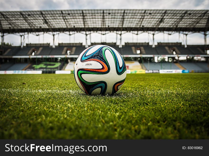 White Black And Green Soccer Ball On Soccer Field