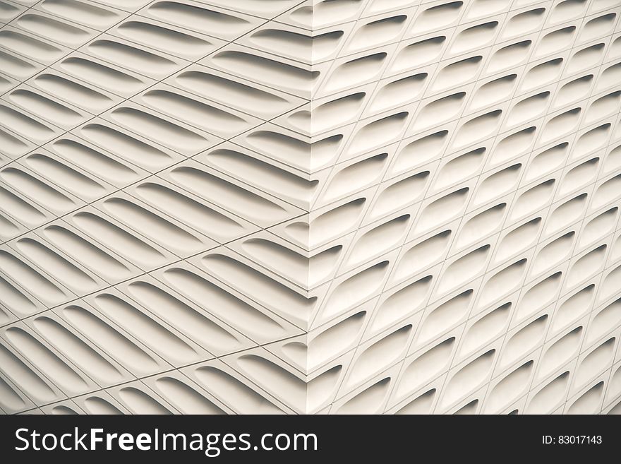 Abstract pattern of modern architecture on exterior of building on sunny day. Abstract pattern of modern architecture on exterior of building on sunny day.