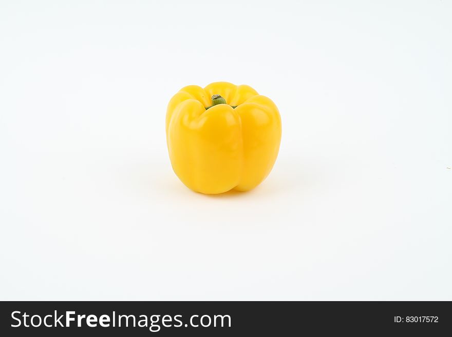 Yellow Round Fruit On White Background