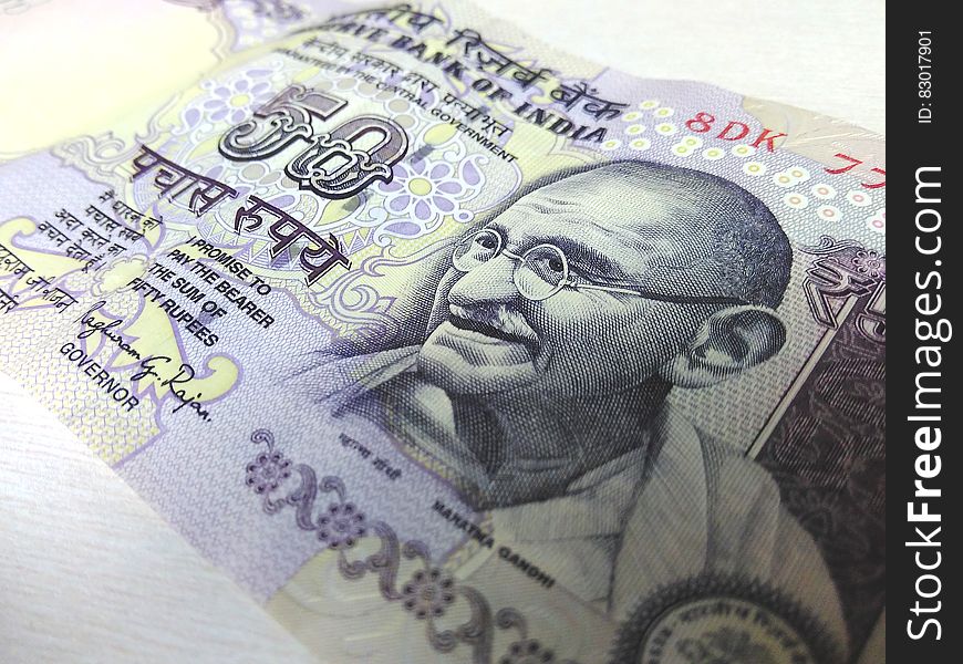 Close up of Mahatma Gandhi portrait on Indian 50 Rupee banknote. Close up of Mahatma Gandhi portrait on Indian 50 Rupee banknote.