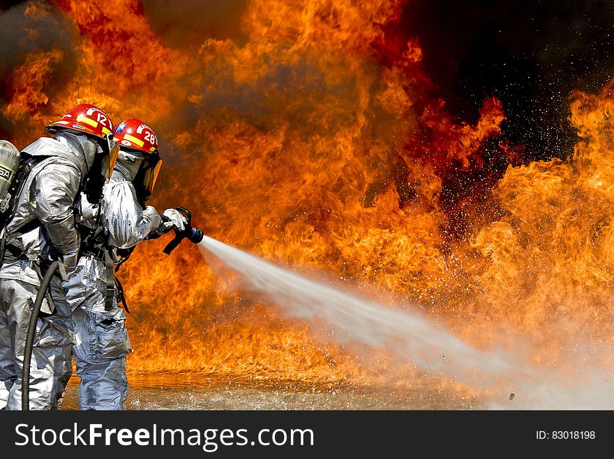 Photo Of A 2 Fireman Killing A Huge Fire