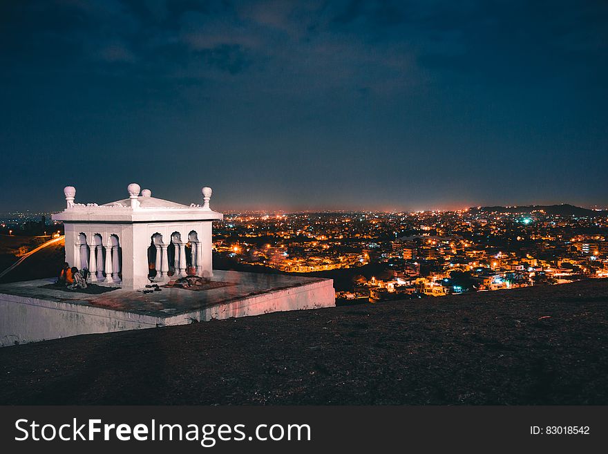 White House on the Roof Deck With City Skyline View during Night Time