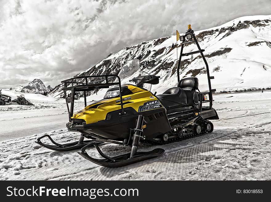 Yellow and Black Snowmobile