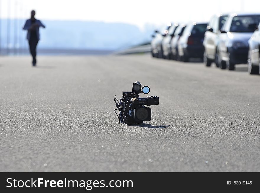 Video Camera on Asphalt Road