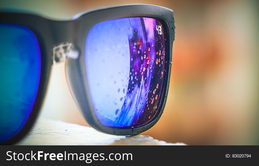Bubbles Reflected on Lens of Black Framed Sunglasses