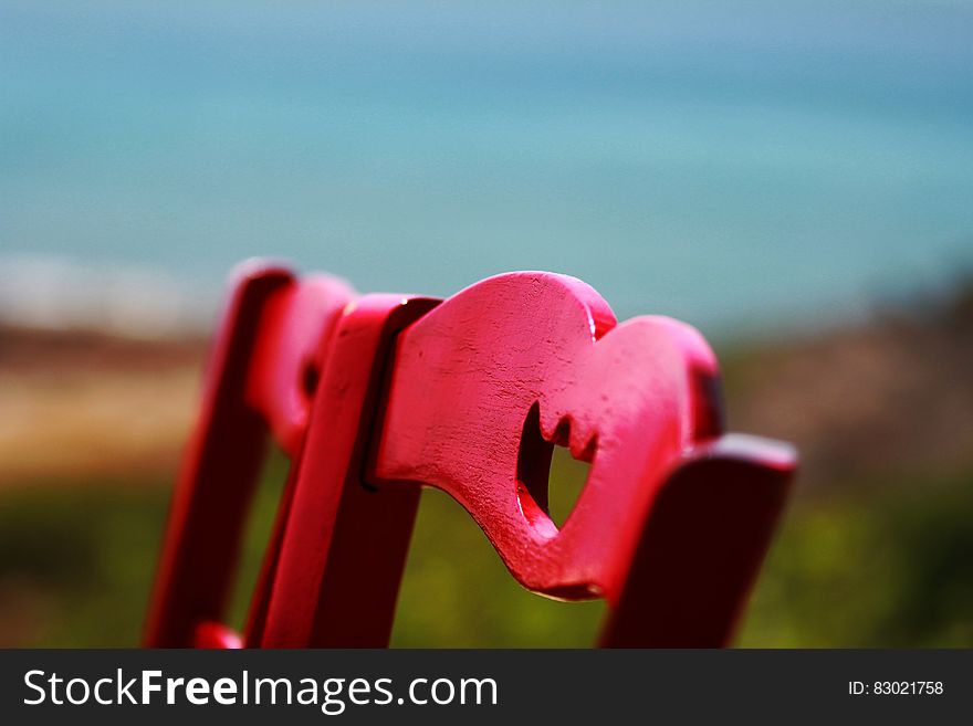 Red Wooden Chair Close Up Photography