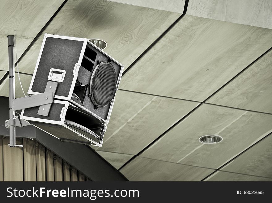 A loudspeaker mounted in the ceiling. A loudspeaker mounted in the ceiling.