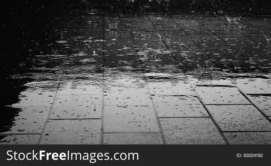 Greyscale Photo of Rain Drops