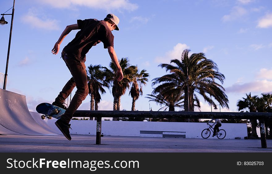 Man Playing Skateboard During Daytime