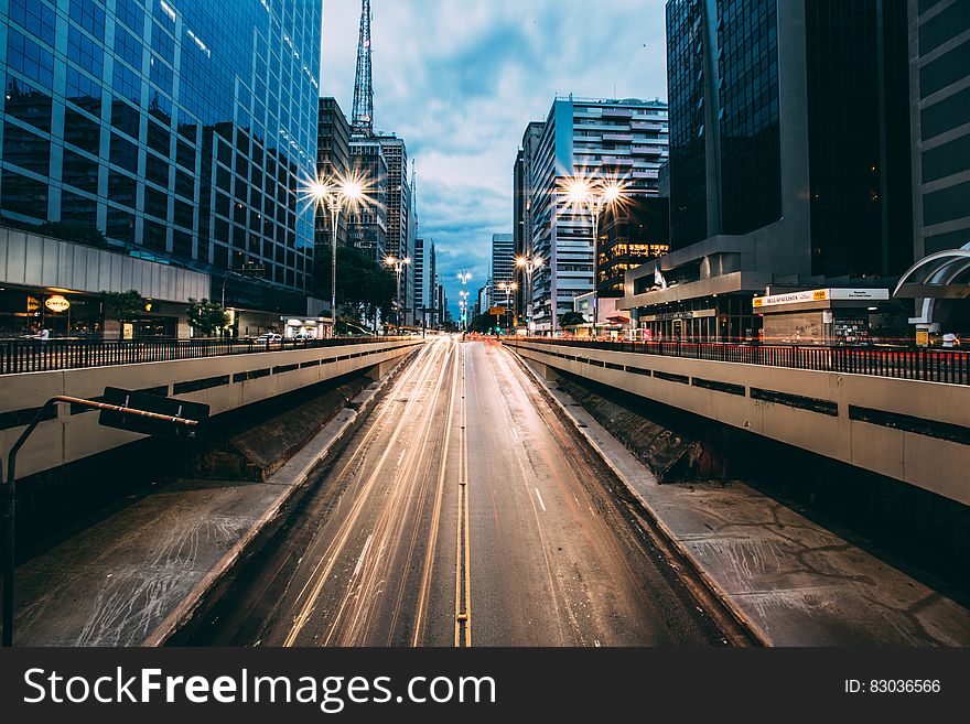 Grey Highway Between High Rise Building