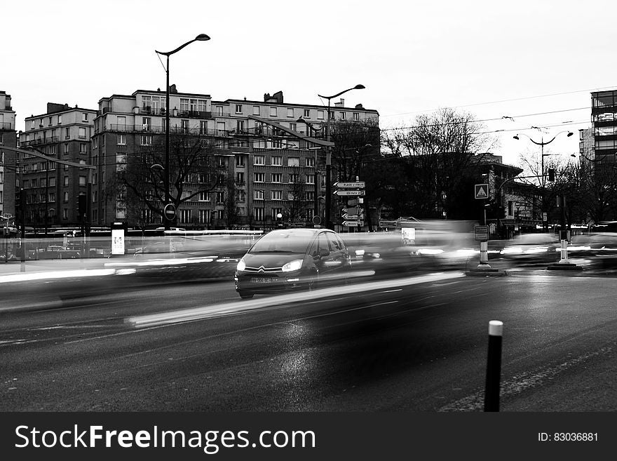 Vehicles on Road in Grayscale Photography