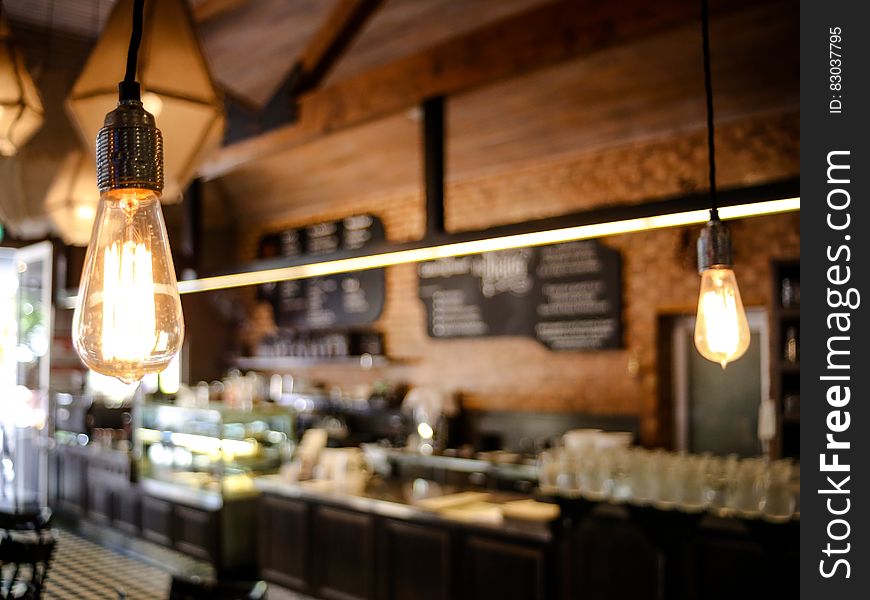 Close up of electric light bulb inside cafe. Close up of electric light bulb inside cafe.