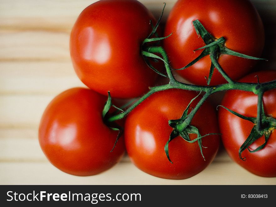 Red tomatoes on vine