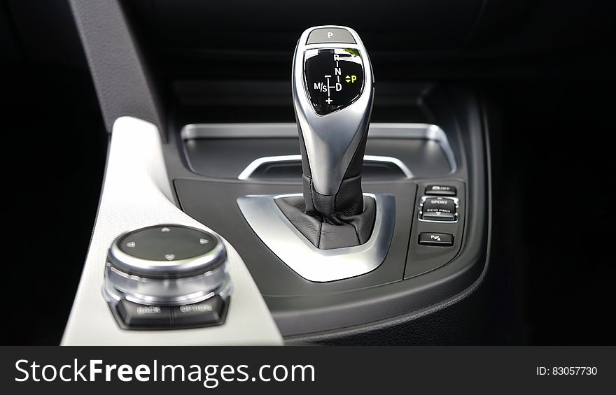 Close up of gear shift in luxury automobile. Close up of gear shift in luxury automobile.