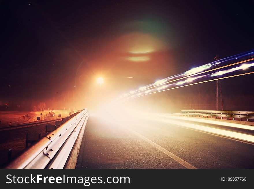 A long exposure of a highway street at night. A long exposure of a highway street at night.