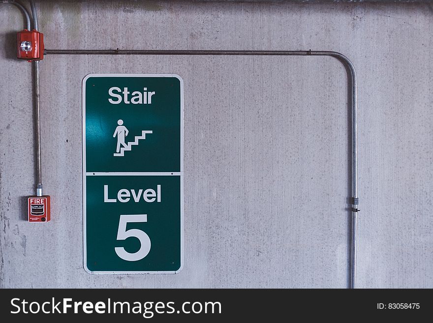 Green and White Stair Level 5 Signage