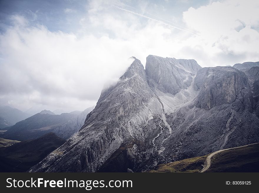 Gray Mountains Under Cloudy Sky