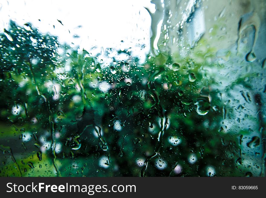 Rain Drops on Glass Surface during Daytime