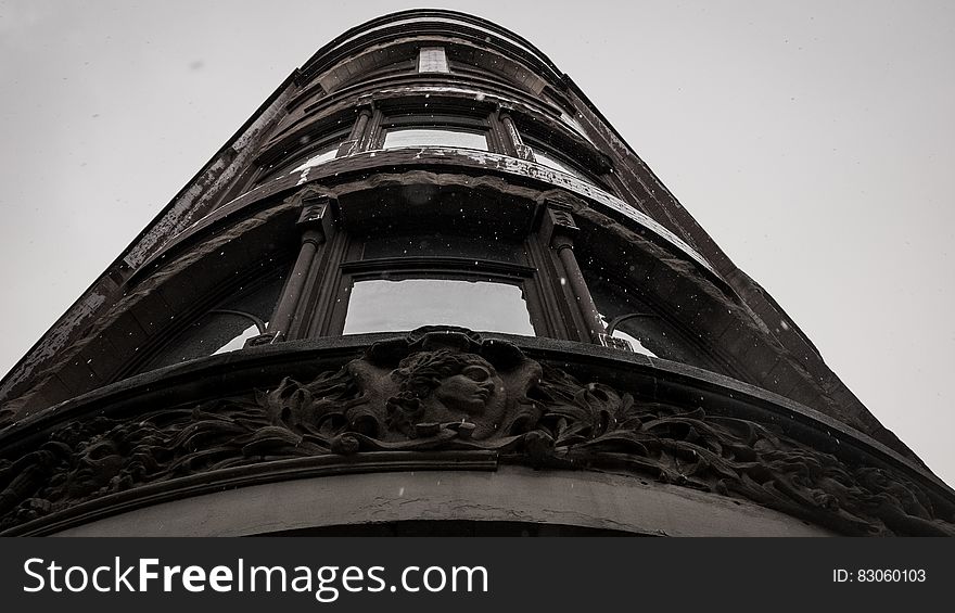 Facade of a historic building from a low angle. Facade of a historic building from a low angle.