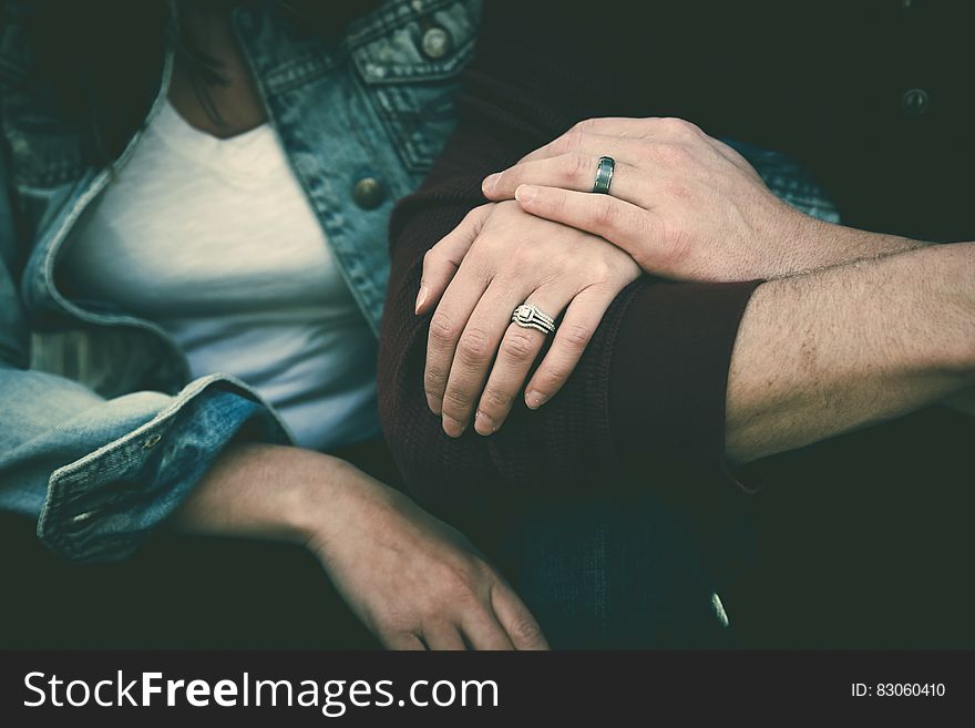 Man And Woman Couple Wearing Their Silver Couple Bond Ring