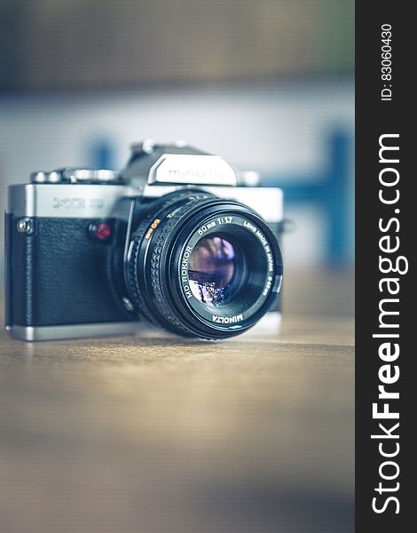 Shallow Focus Photography of Black and Silver Slr Camera