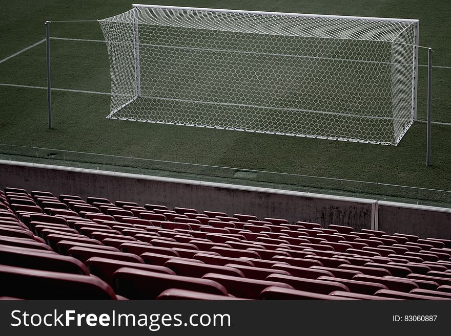 Stadium Seats Near White Soccer Goal