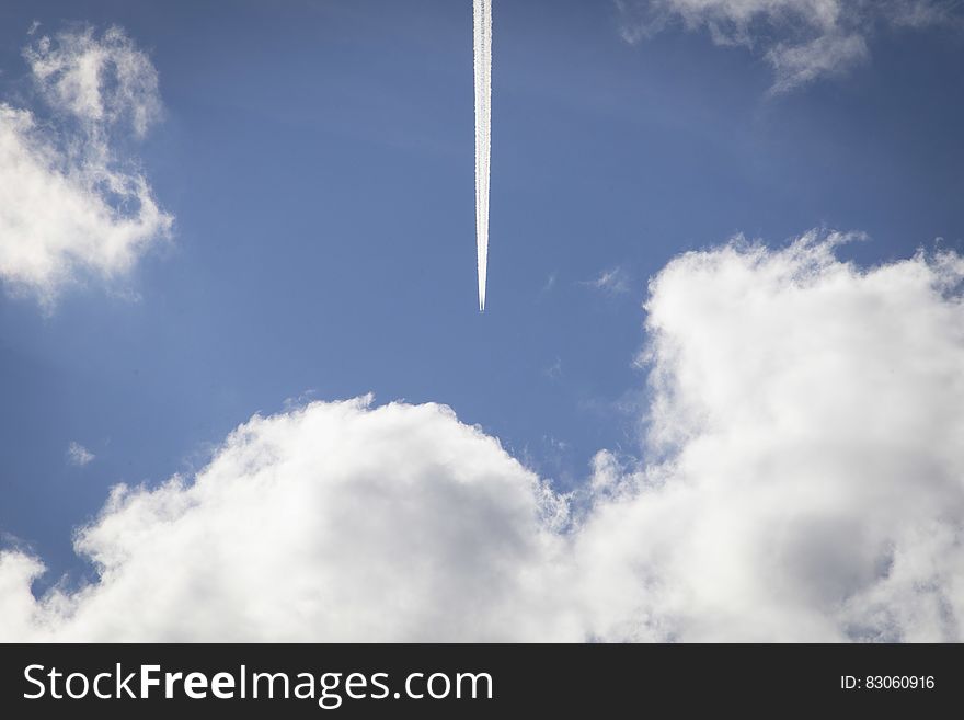 Airplane Streak In Sky