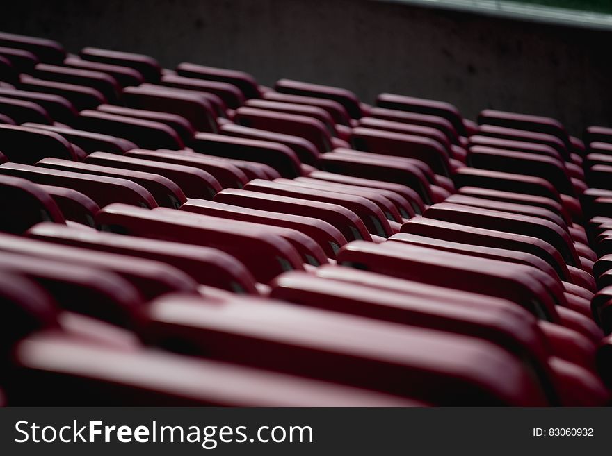 Selective Focus Photograph of Red Oval Shape Equipment