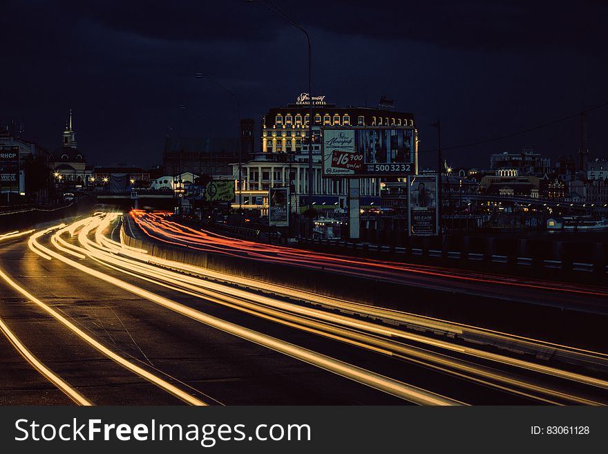 Timelapse Photography of Street With Vehicle Moving during Night Time