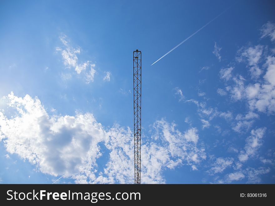 Black Tower Under Blue Sky During Daytime