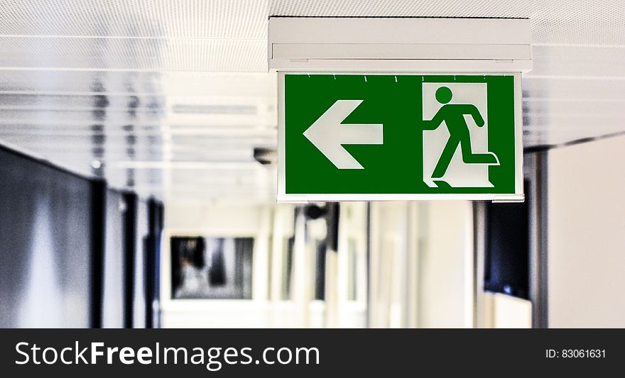 Green and White Male Gender Rest Room Signage